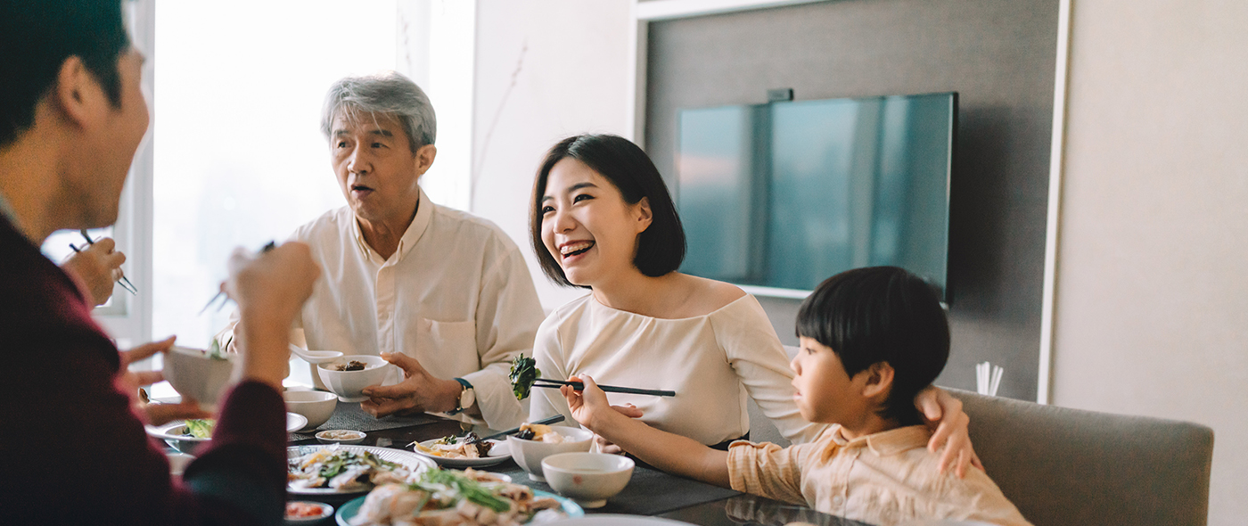 Family celebrating Chinese new year at home